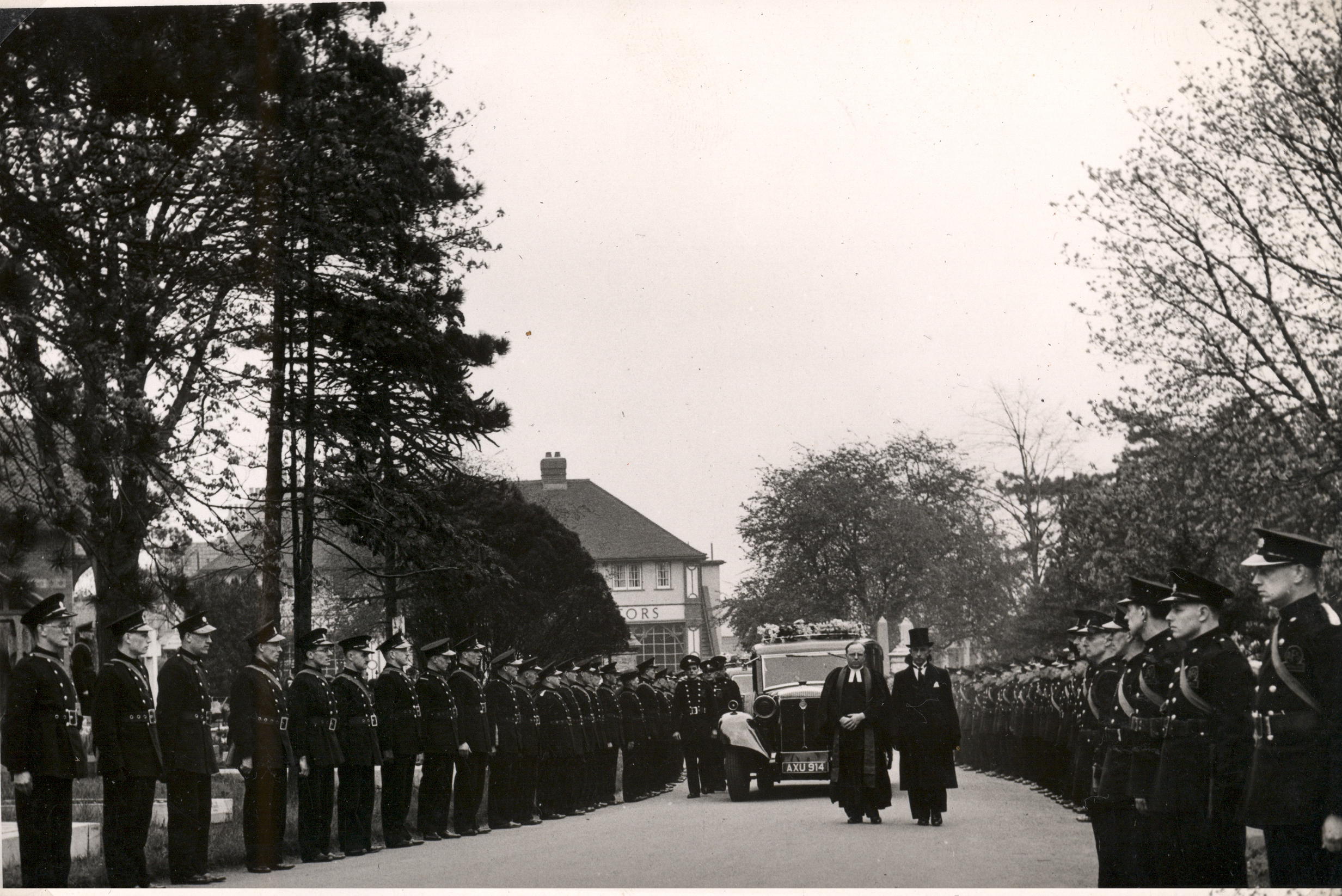 Funeral cortege at cemetery